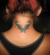 butterfly pic tattoo on back of neck