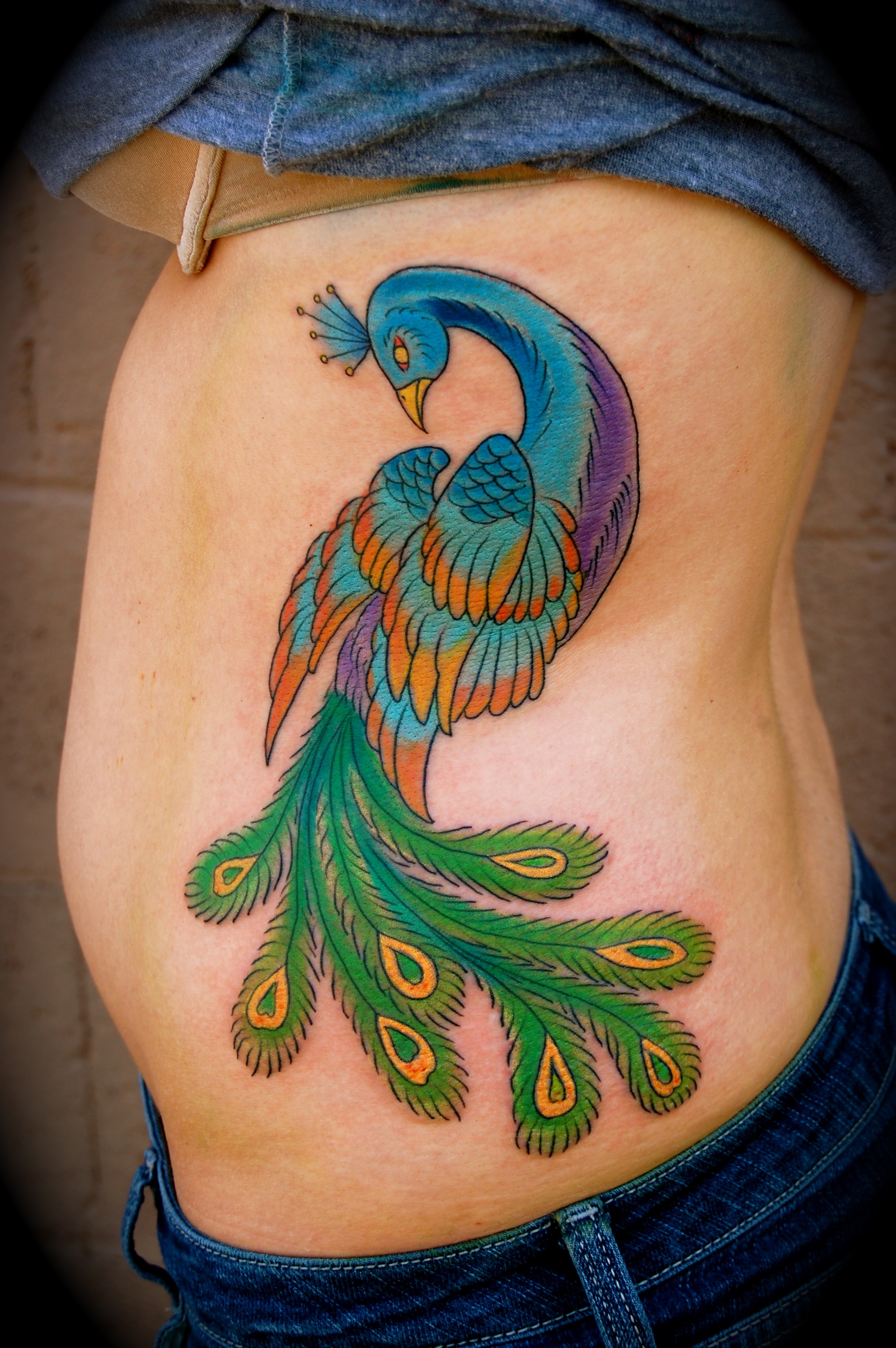 Peacock Tattoo On Back Of Ear