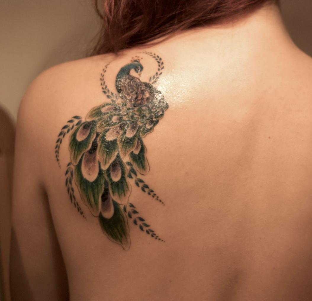 Matching illustrative tattoos on the shoulder blades. | Shoulder blade  tattoo, Blade tattoo, Back of shoulder tattoo