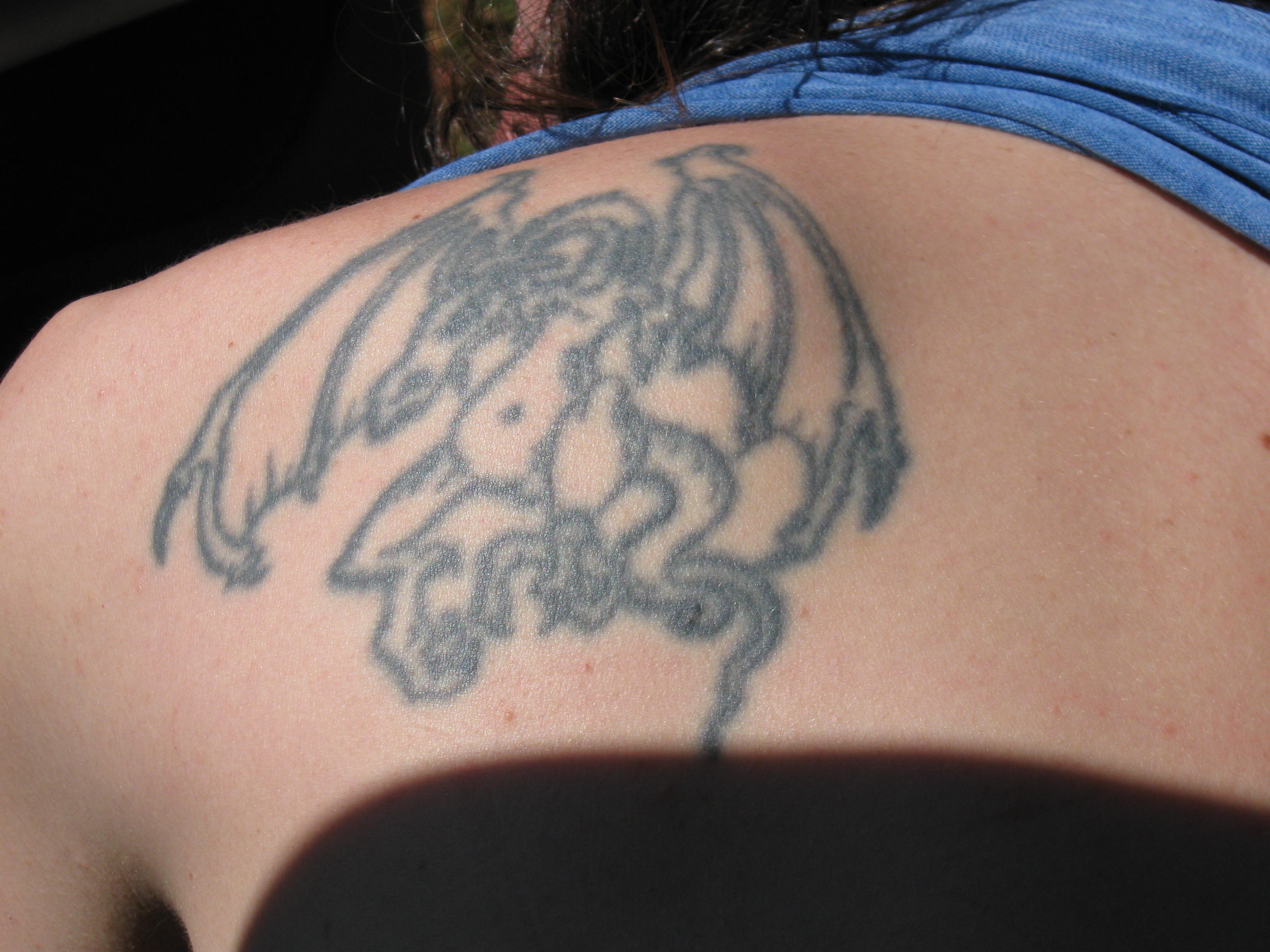 Japanese dragon tattoo on shoulder and chest on Craiyon