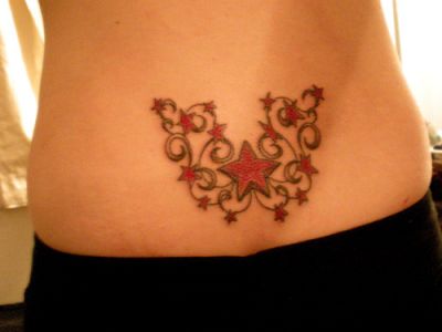 A woman with a rose tattoo on her stomach photo – Menstrual blood Image on  Unsplash