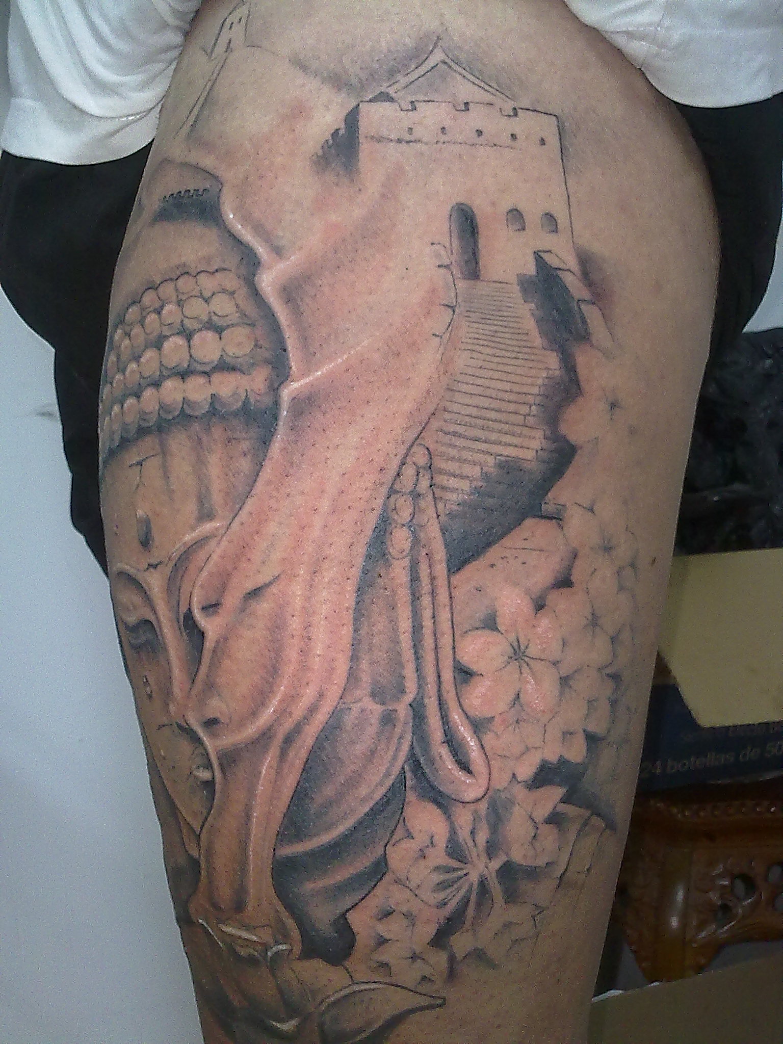 Buddha Tattoo Sleeve with Dragon Design