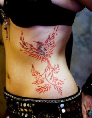 Tattoo uploaded by Cory Jahn • Current tats - Rib tribal, cross, & tiger  forearm (unfinished) • Tattoodo
